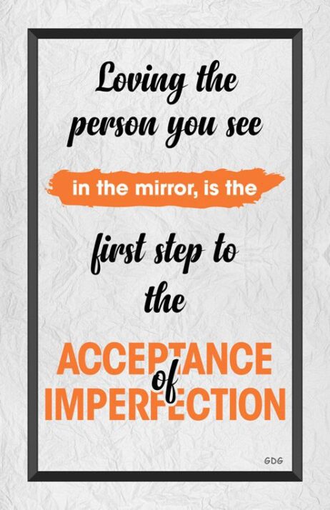 A poster with the words being the person you see in the mirror is the first step to the acceptance of imperfection.